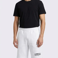 Comme Des Fuckdown | Pantaloncini con Logo | Colore Beige | Outlet Comme Des Fuckdown